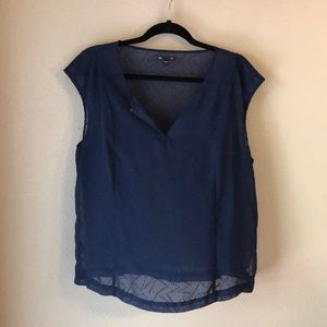 Navy blue, short-sleeved sheer blouse.